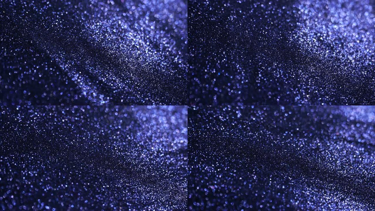 聚焦和旋转技术的4k蓝色闪光元素。