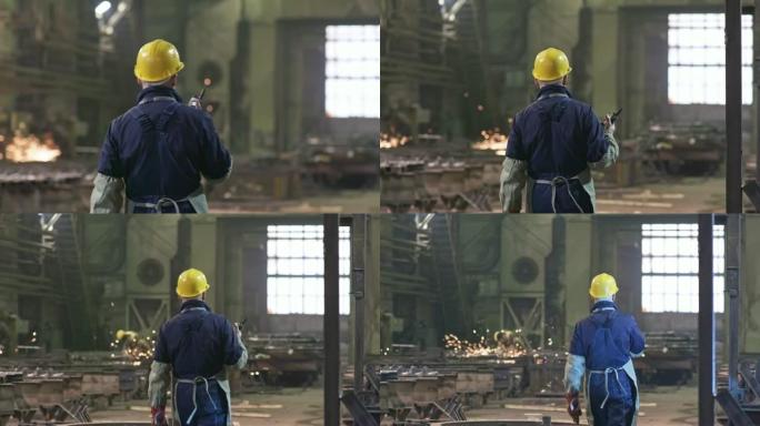 工厂里有对讲机的男工人