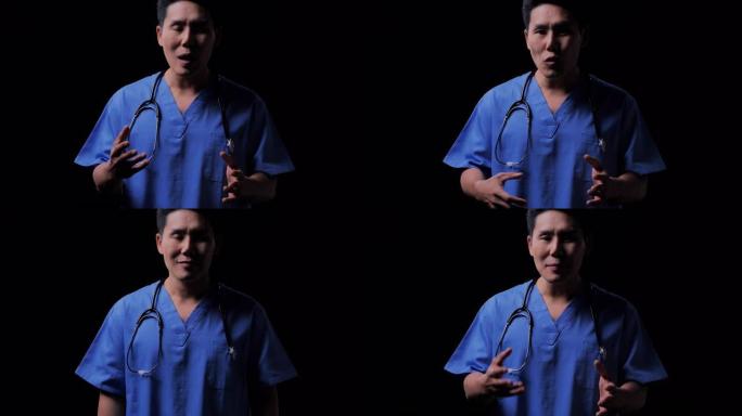 经验丰富的亚洲男医生对着镜头说话，帮助患者进行医疗咨询，预防冠状病毒或新冠病毒的流行。医生在以黑人为