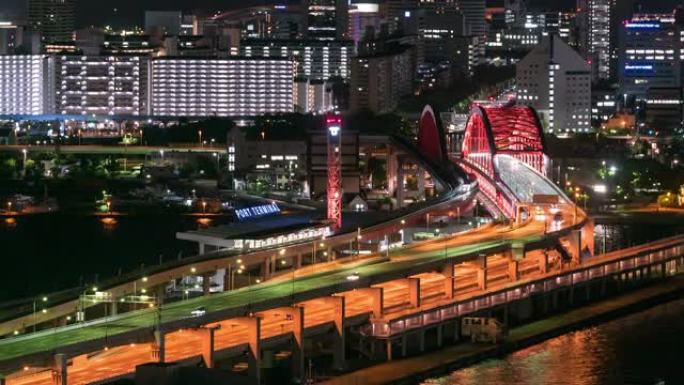 延时: 神户港和火车站在夜间到机场的鸟瞰图