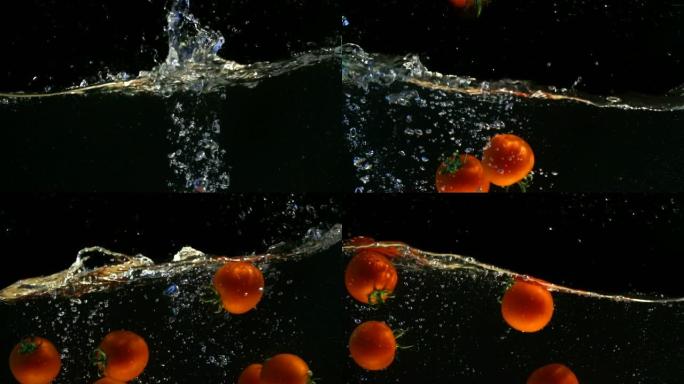 西红柿掉进水里。黑色背景。慢动作。