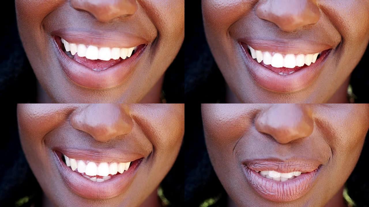 一个微笑的黑人妇女的牙齿特写