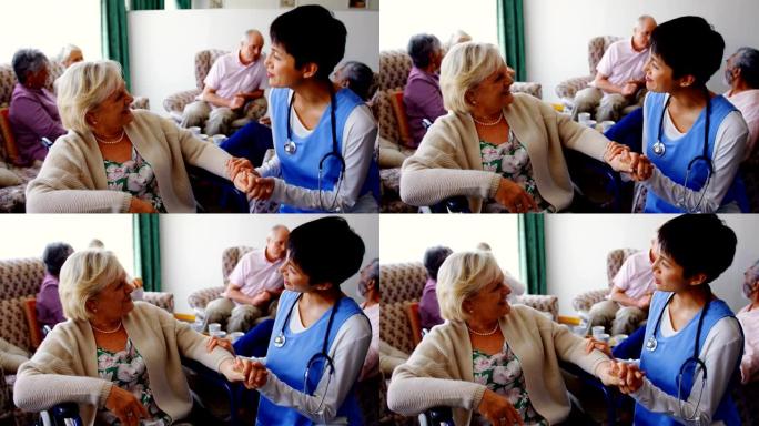 亚洲女医生与养老院高级女性互动的前视图4k