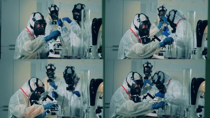 COVID-19实验室，冠状病毒抗体研究概念。研究人员正在实验室里进行测试