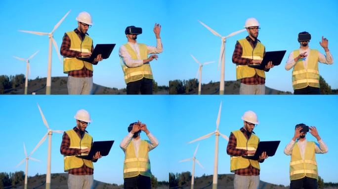风车场，两名男性专家测试虚拟现实眼镜。清洁、环保的能源概念。