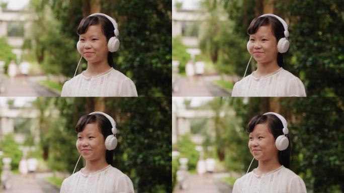 台湾一个公共公园听音乐的年轻女孩
