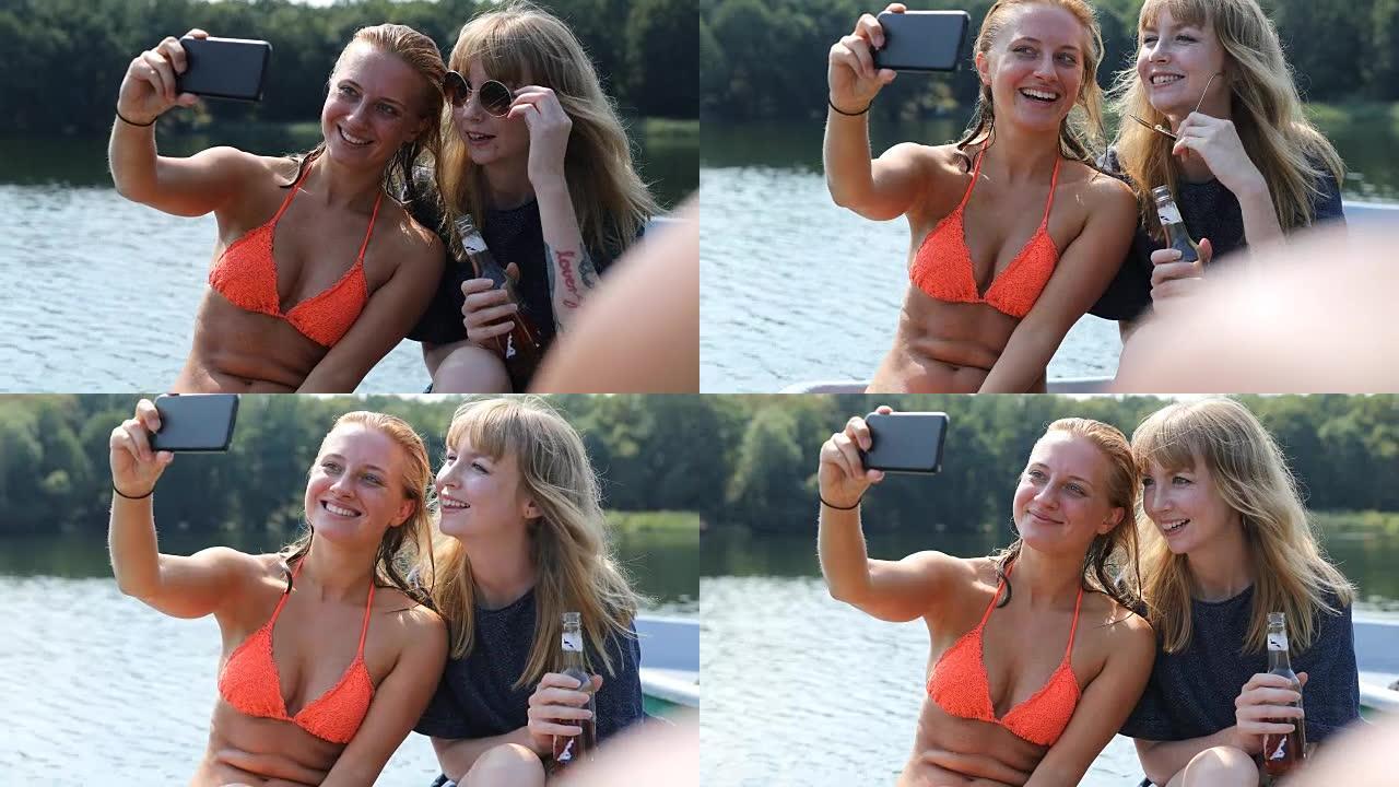 妇女在划艇上使用智能手机自拍