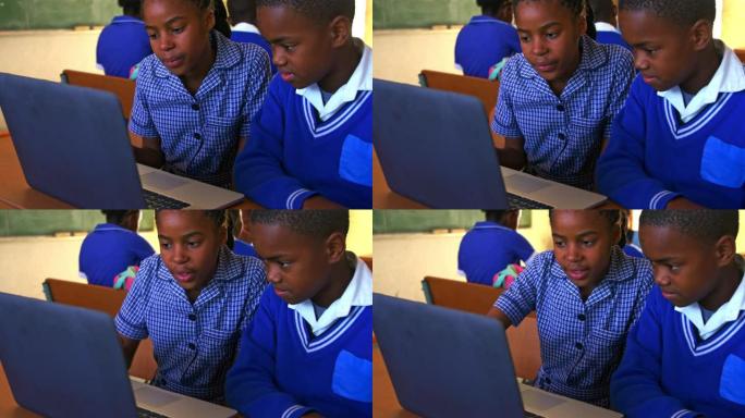 小学生在乡镇学校的一堂课中使用笔记本电脑4k