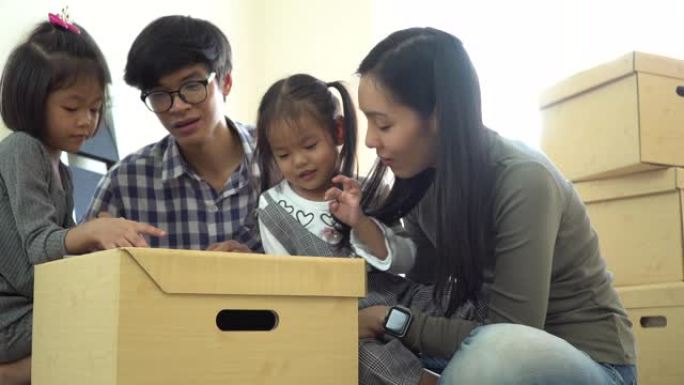 亚洲家庭搬到新家一家人搬家幸福温馨包装盒
