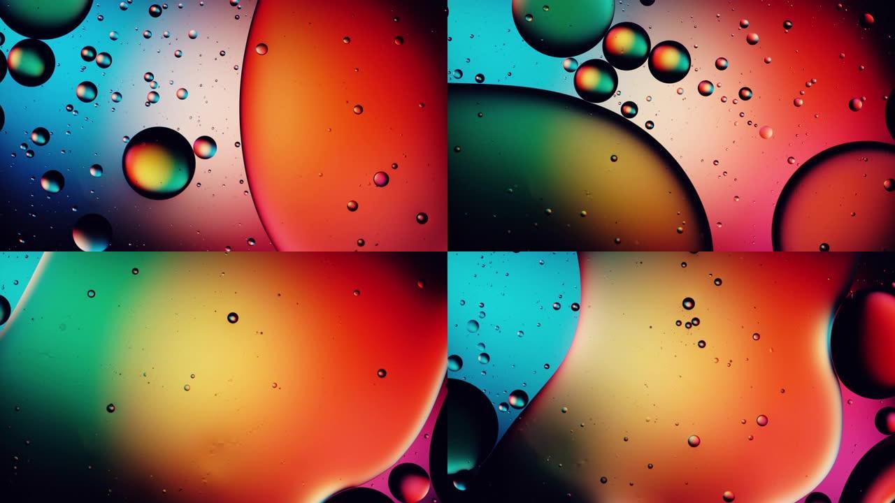 充满活力的彩色背景下水中的油泡
