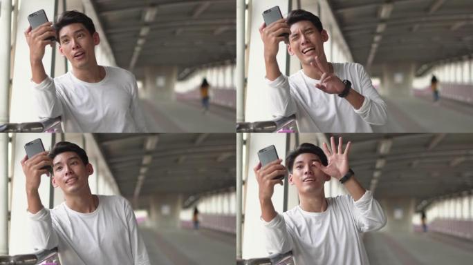 一个年轻人在手机上进行视频通话的肖像