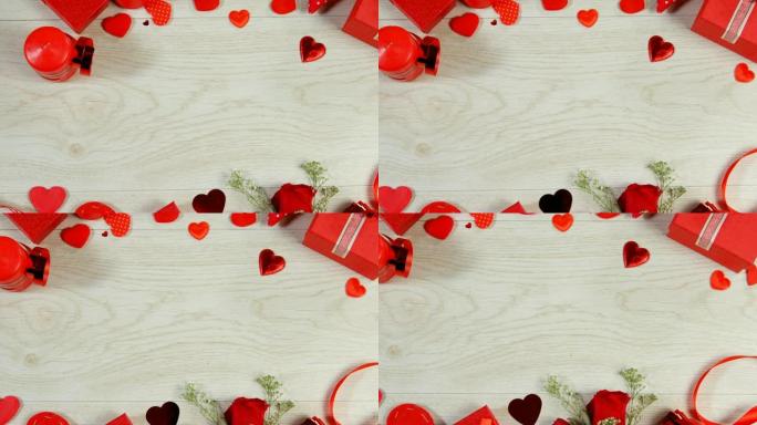 木面4k红玫瑰、礼品盒和心形五彩纸屑