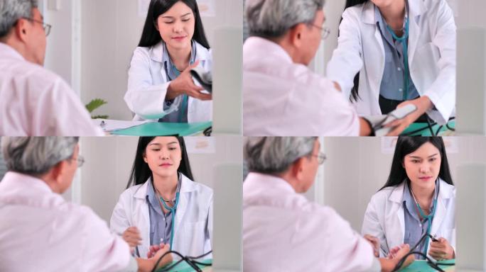 医生女性使用血压计对医院的高级患者进行血压检查医学教育，保健，技术，人和医学概念医疗咨询医生和患者咨