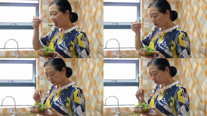 吃沙拉的高级女性饮食健康营养搭配素食主义