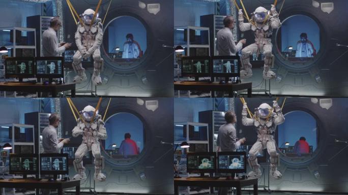 宇航员在挂在乐队上时移动四肢