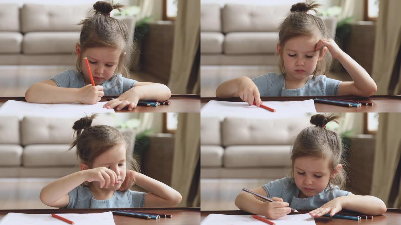 专注可爱的小女孩独自玩铅笔画画
