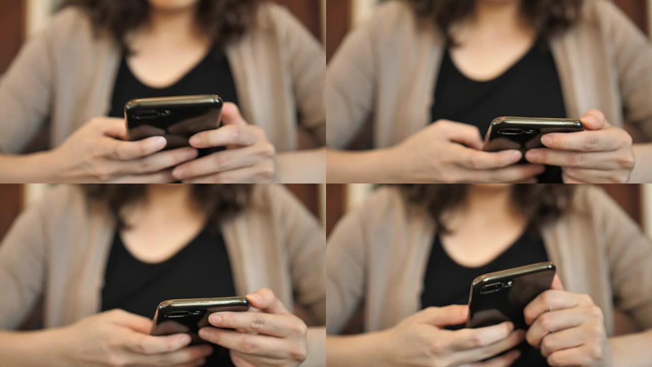 使用电话的女人玩手机走路看手机刷微博