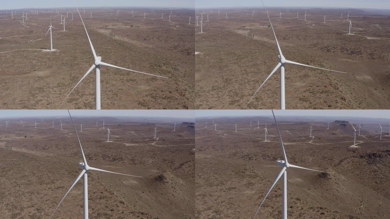 风力涡轮机未转动的4k空中特写平移视图，这导致了产生能量的主要问题