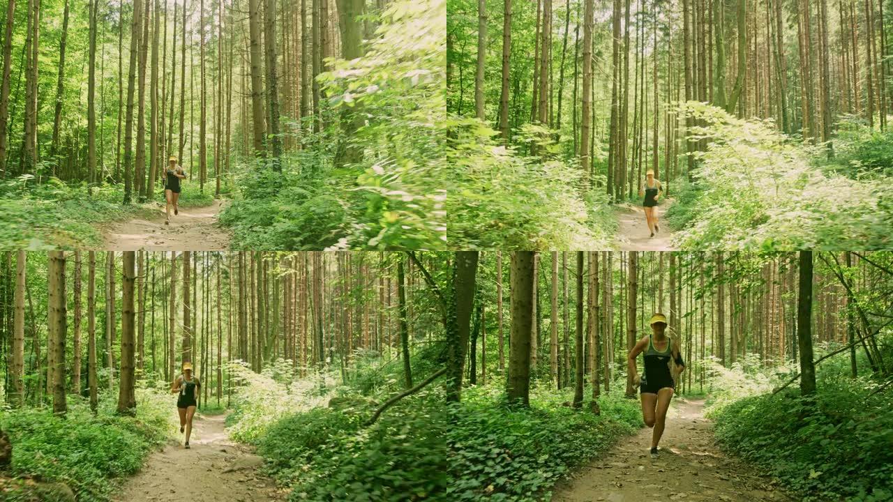 在阳光明媚的日子里，SLO MO女人在森林里奔跑