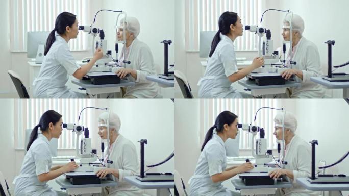 为高级女性提供眼部测试的眼部护理专业人员