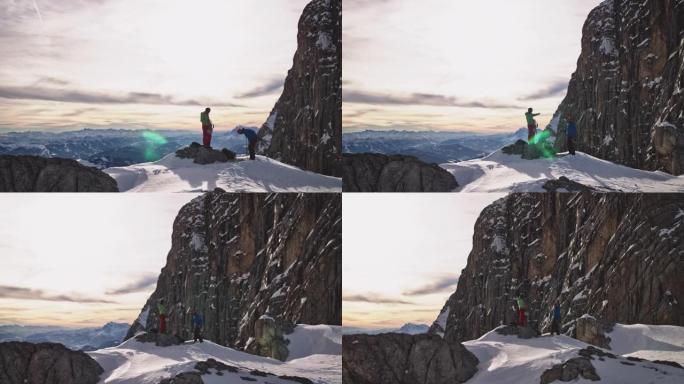 男性朋友准备登山逆光炫光光斑高山崖壁航拍