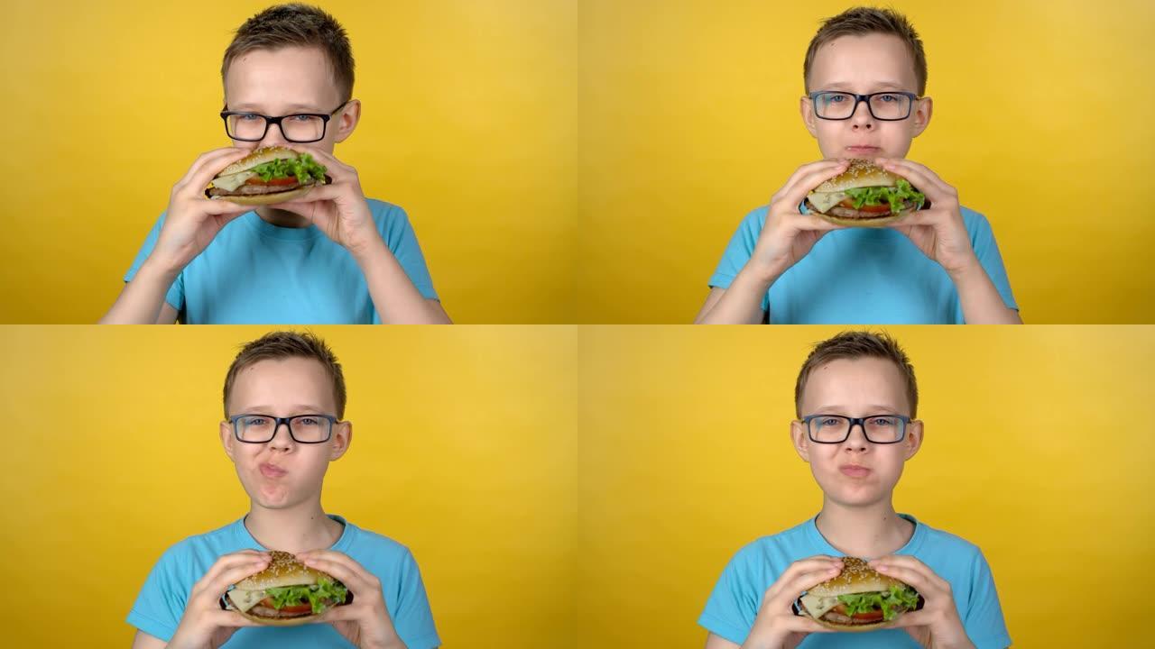 吃汉堡的可爱男孩小孩子吃汉堡男孩吃汉堡男