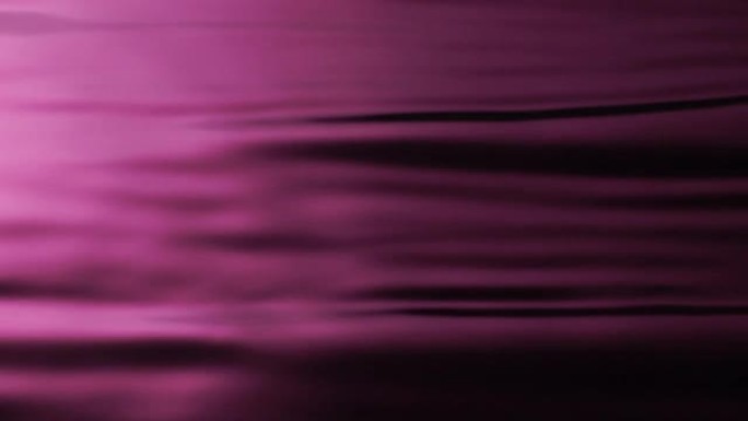 慢动作: 水波图案的粉红色背景。