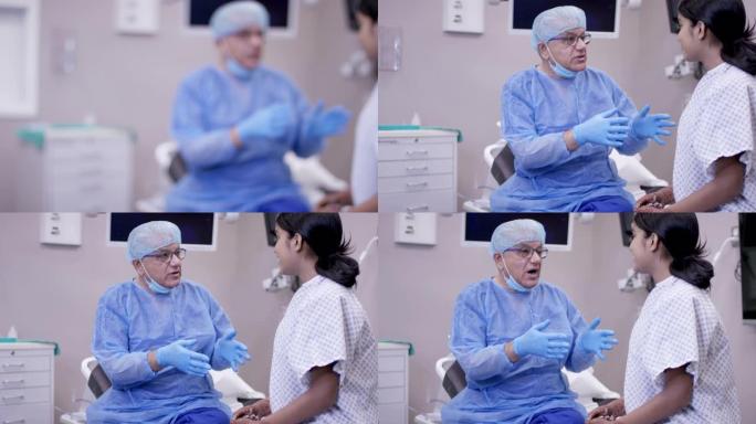 印度医生在手术前咨询女病人