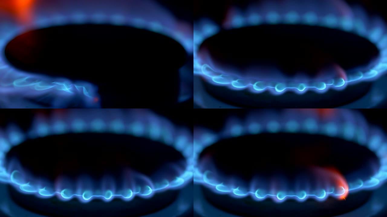 在整个黑暗的房间里，甲烷在燃气灶上燃烧着蓝色火焰。4K