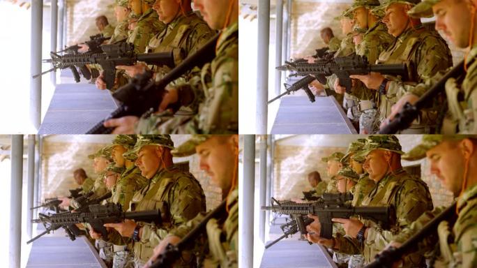 侧面的混合种族士兵在军事训练期间装载武器4k
