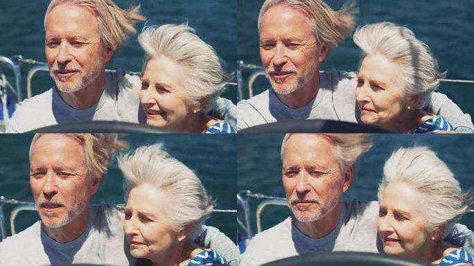 快乐的老夫妻在游艇旅行时聊天