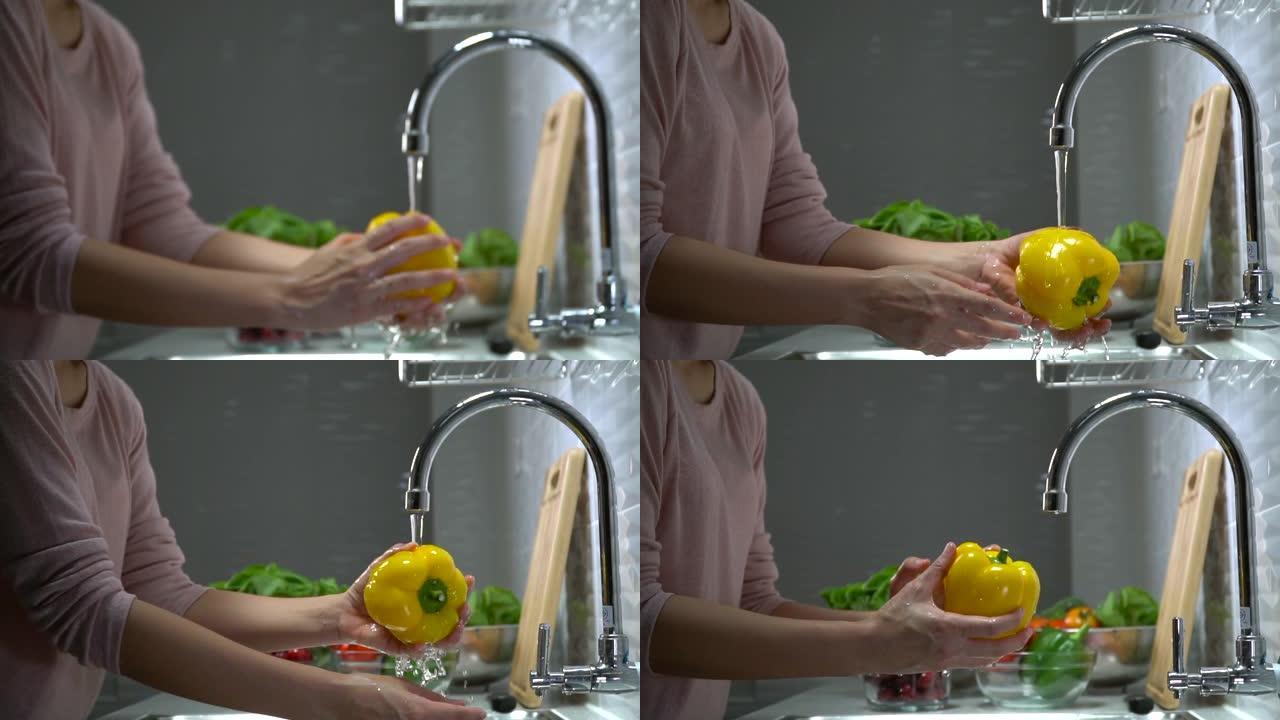 清洗黄色甜椒清洗黄色甜椒厨房双手