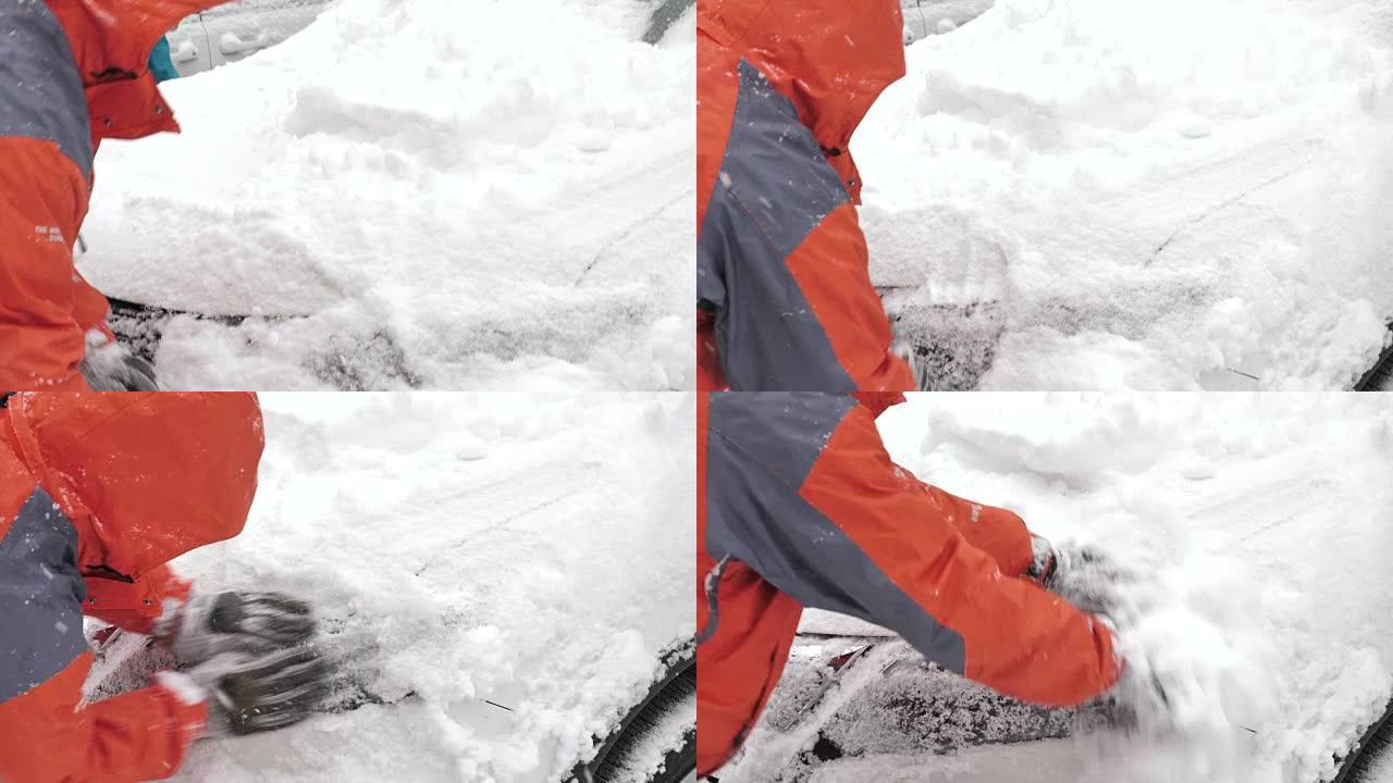 驾驶员从雪地上清洁汽车前灯