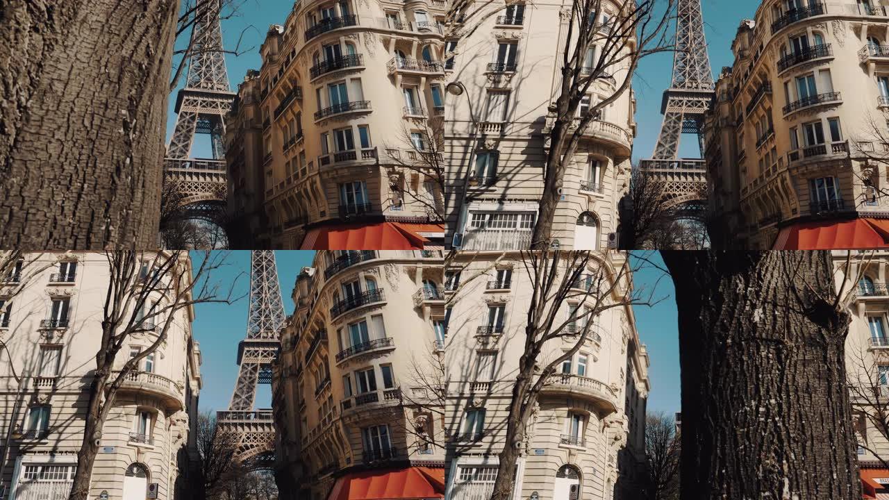 相机沿着公寓楼的树后滑动，在阳光明媚的秋天早晨巴黎展现史诗般的埃菲尔铁塔。