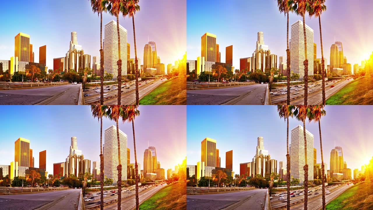 洛杉矶。商业区。日出。棕榈树，路。公司建筑