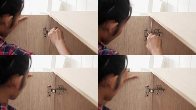 女人做DIY工作，在家组装家具