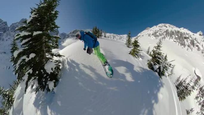 自拍照: 滑雪板手在未触及的山上加速时切碎新鲜的粉末