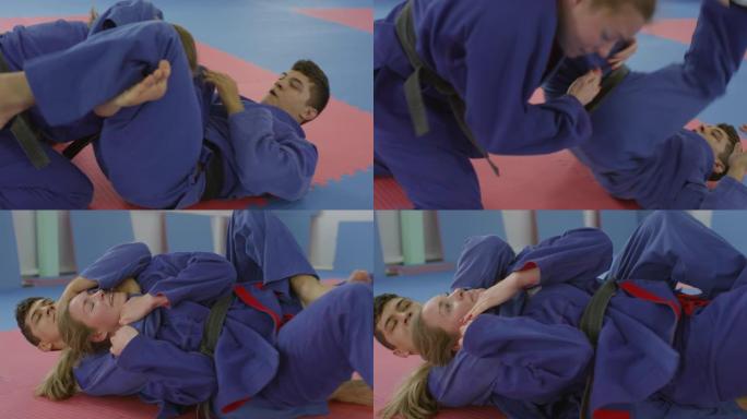 男女柔术运动员在地板上战斗的顺序