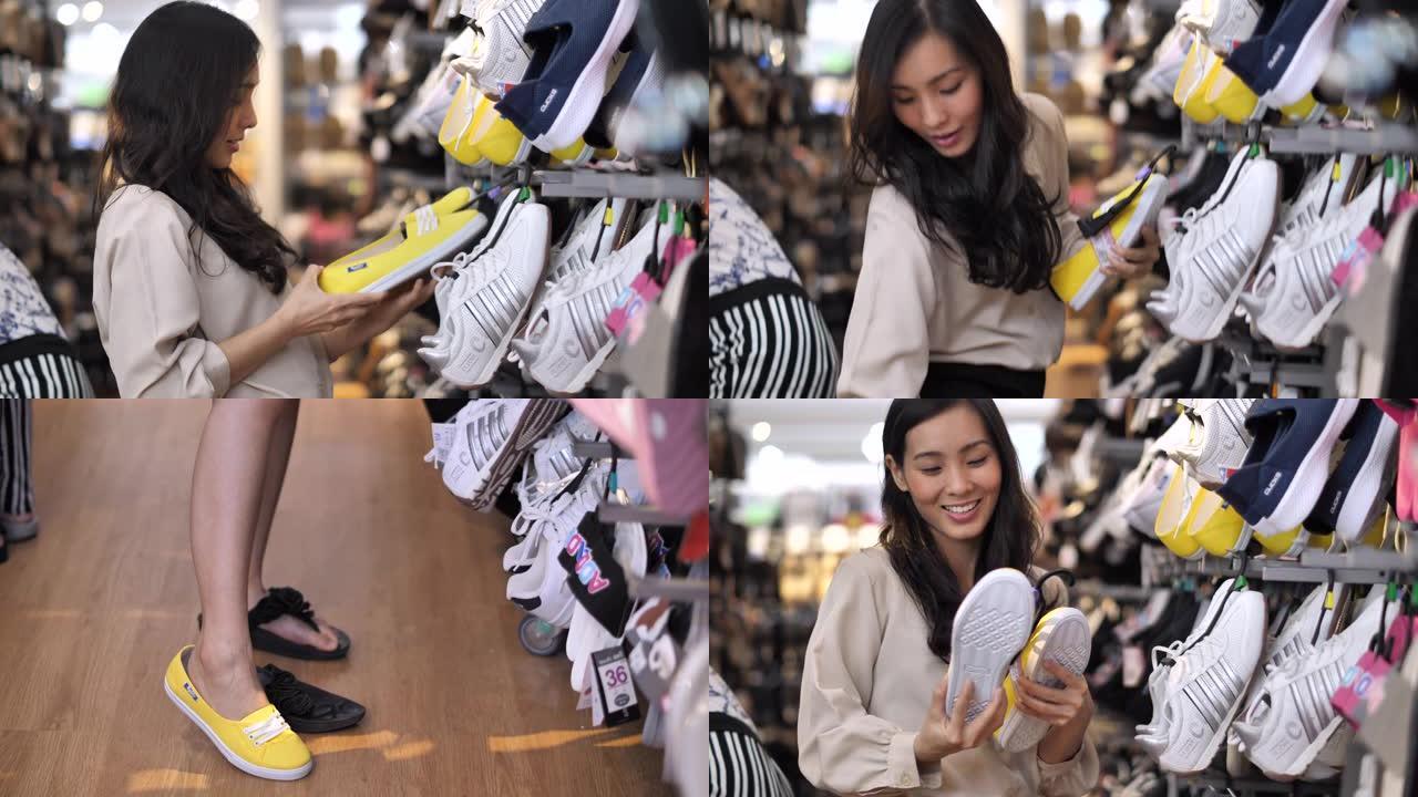 年轻的亚洲女性在商店选择鞋子