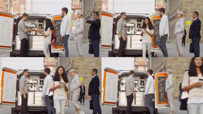 忙碌的咖啡师从移动货车向顾客提供外卖咖啡