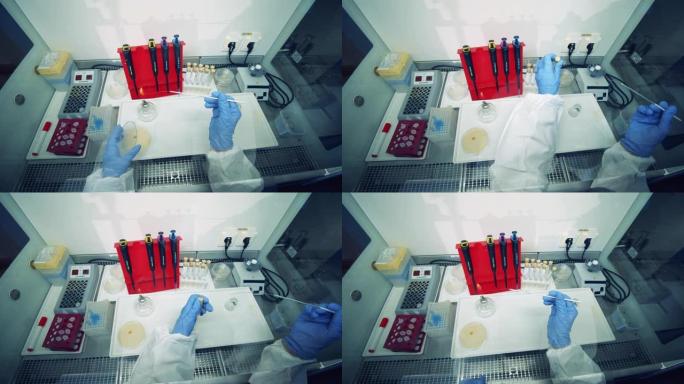 科学家在实验室研究疫苗。