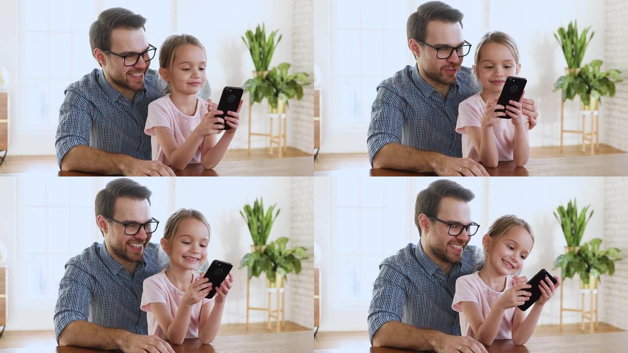 爸爸和孩子的女儿博客在智能手机上记录生活方式vlog