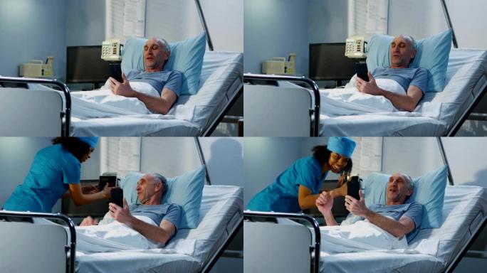 在病房中使用视频通话的男性患者