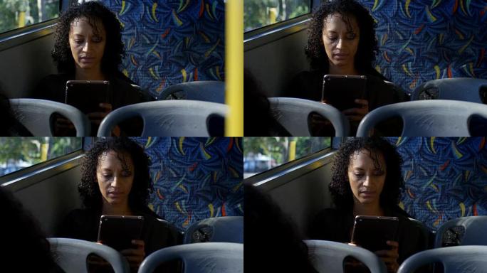 在公交4k中使用数字平板电脑的女性通勤者