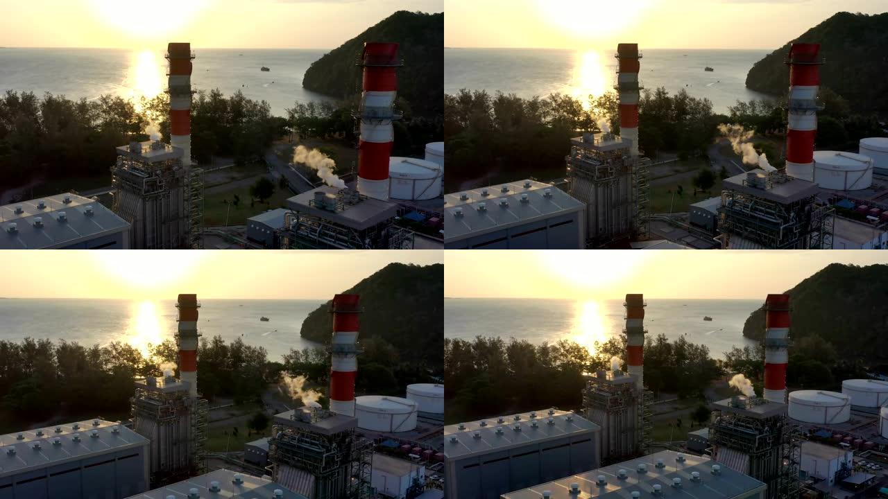 日出时海上联合循环发电厂热回收蒸汽发生器 (HRSG) 、钢结构、储罐和烟囱的鸟瞰图