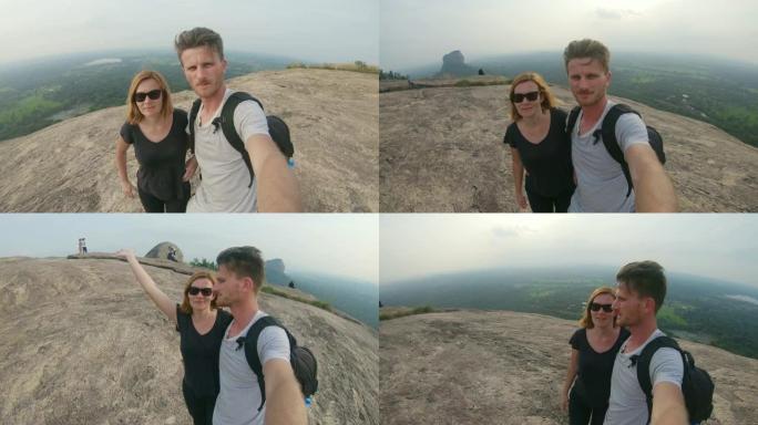 MS夫妇与自拍杆在斯里兰卡风景秀丽的山上
