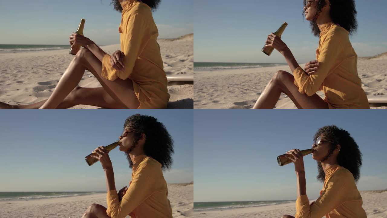 女人在海滩上喝啤酒4k
