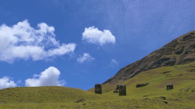 无人机在空旷的草地上飞向复活节岛的火山