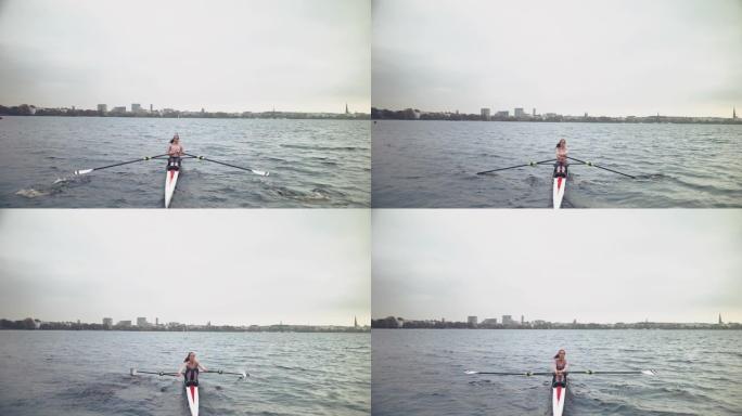 女人在河上划着划艇逆天