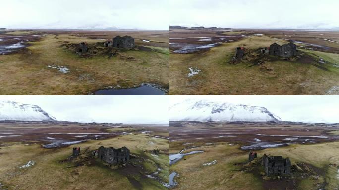 WS在冰岛偏远的山区景观中被烧毁的房屋
